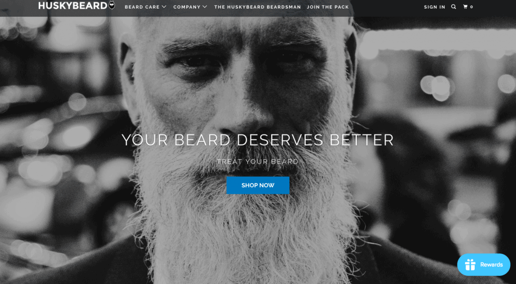 Huskybeard's landing page - a black and white photo of a man with a beard